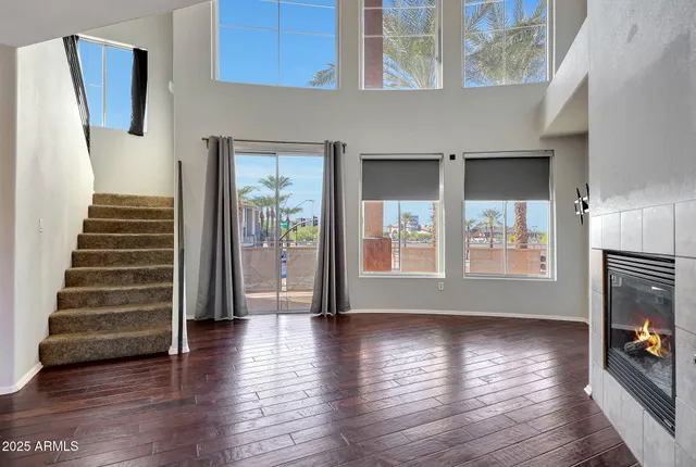 a view of an entryway with wooden floor and a window