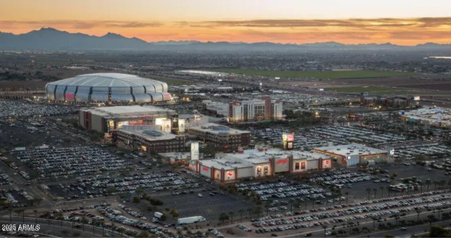 a view of city with the shops and fruits market