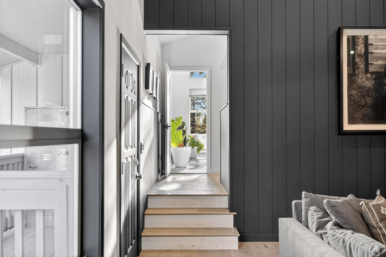 22080 Fiddletown Road Volcano, CA 95689 - Photo 16 of 94 a view of a hallway to a livingroom with furniture and front door