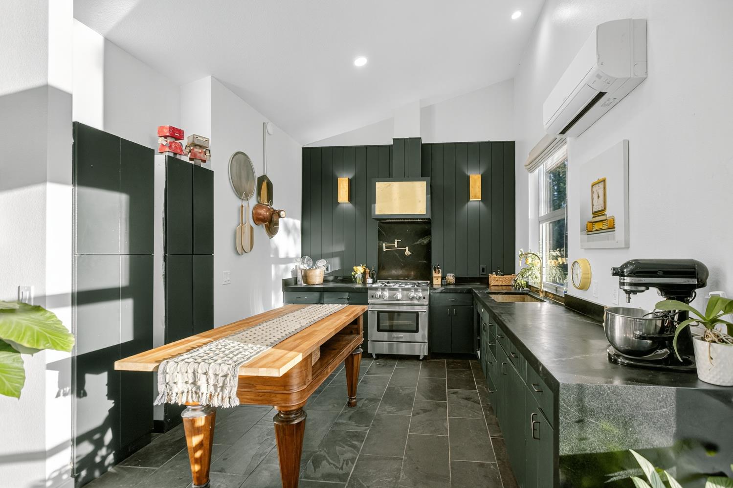 22080 Fiddletown Road Volcano, CA 95689 - Photo 23 of 94 a kitchen with stainless steel appliances granite countertop a sink stove and refrigerator