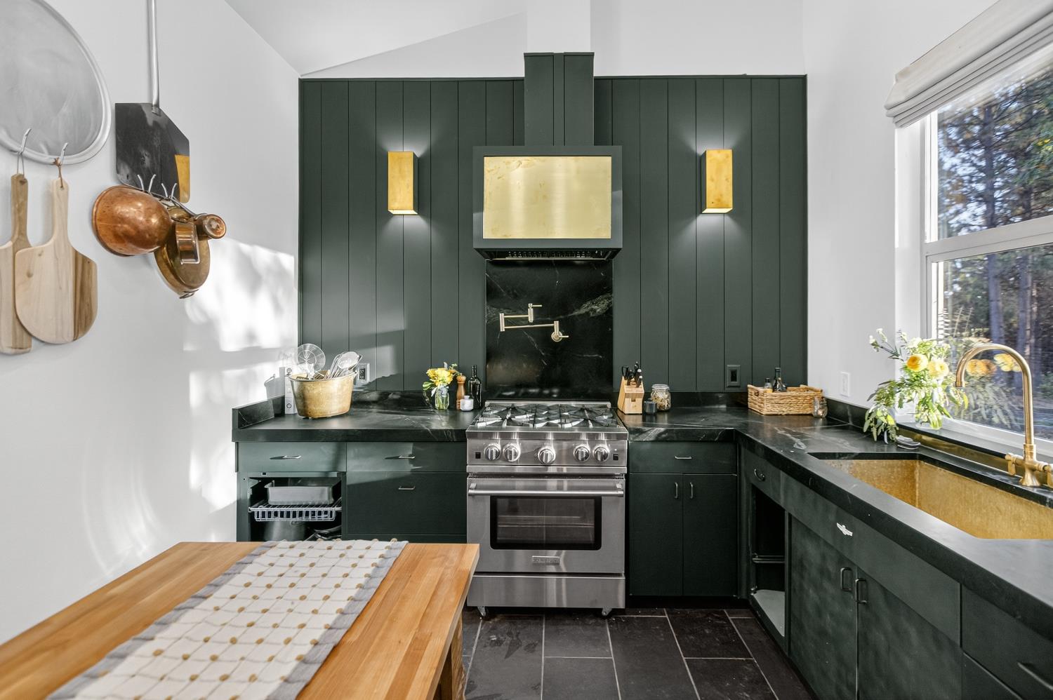 22080 Fiddletown Road Volcano, CA 95689 - Photo 24 of 94 a kitchen with stainless steel appliances granite countertop a stove and cabinets