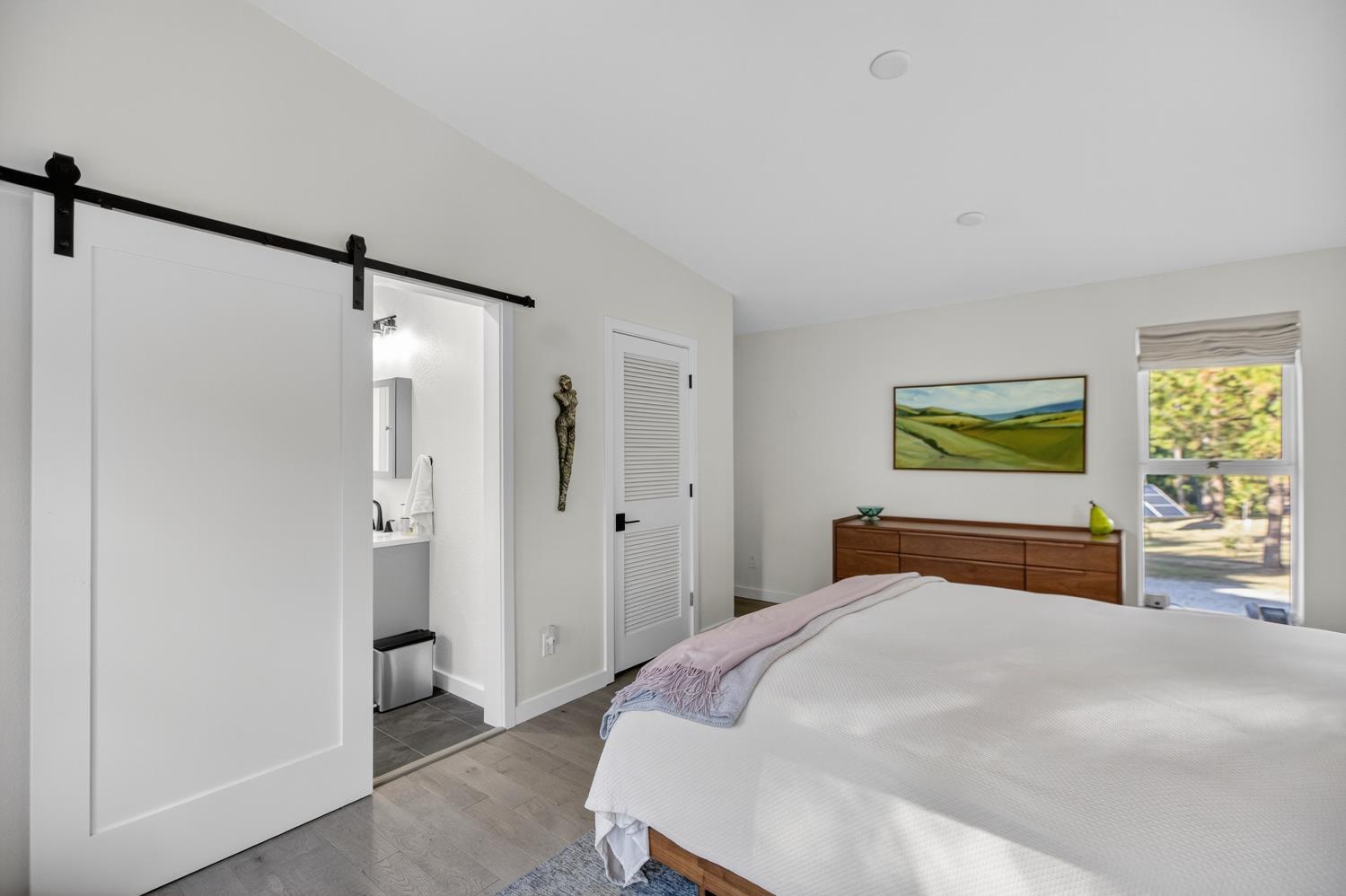 22080 Fiddletown Road Volcano, CA 95689 - Photo 38 of 94 a bedroom with a bed and a window