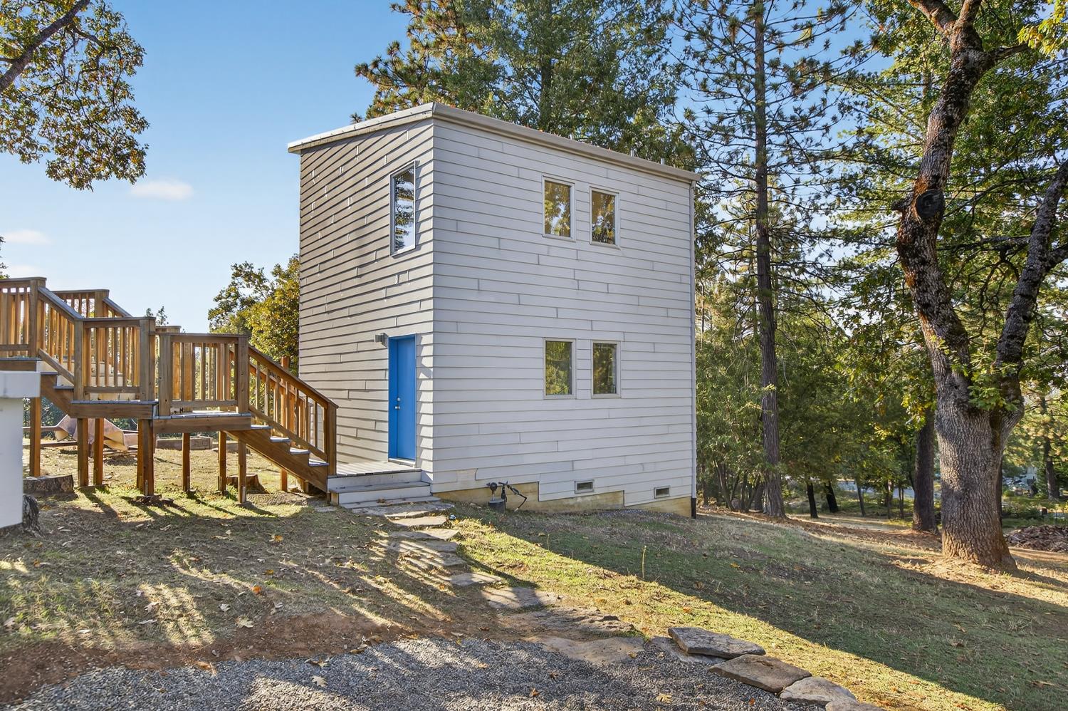 22080 Fiddletown Road Volcano, CA 95689 - Photo 39 of 94 a front view of a house with a yard