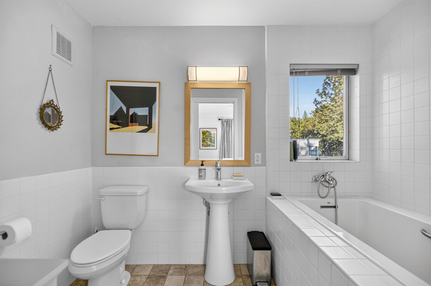 22080 Fiddletown Road Volcano, CA 95689 - Photo 44 of 94 a bathroom with a sink a toilet and mirror