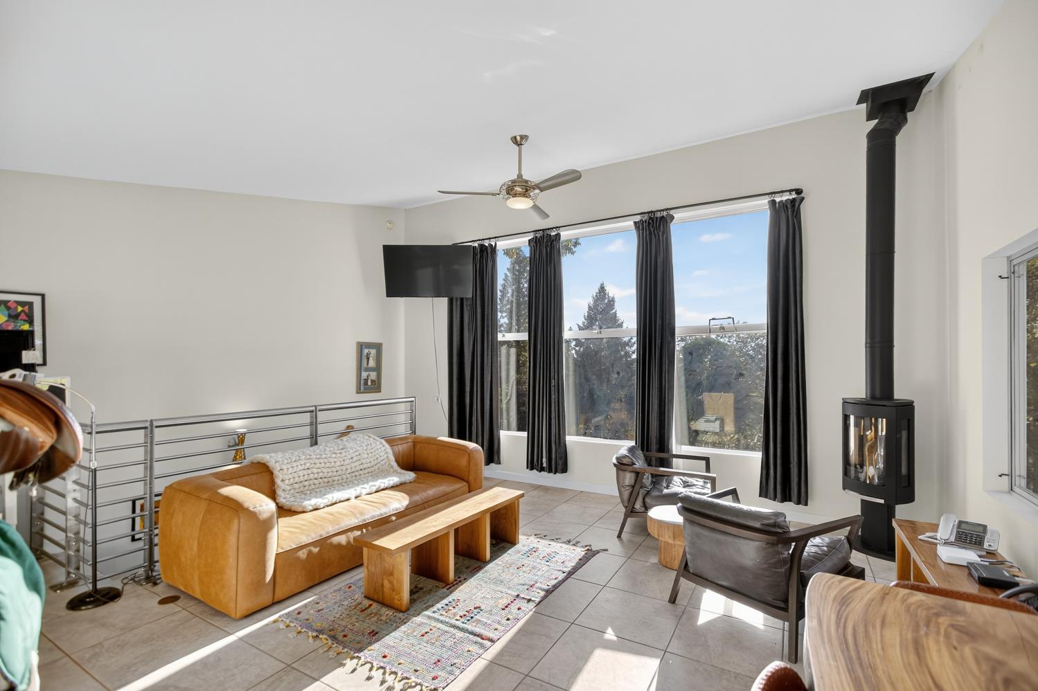 22080 Fiddletown Road Volcano, CA 95689 - Photo 49 of 94 a living room with furniture and large windows