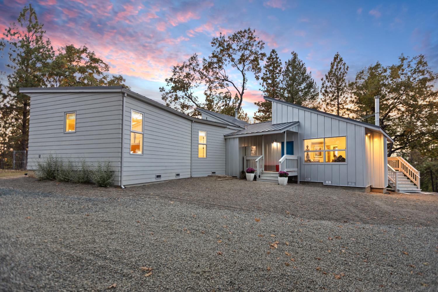 22080 Fiddletown Road Volcano, CA 95689 - Photo 72 of 94 a view of a house with a outdoor space and tree s