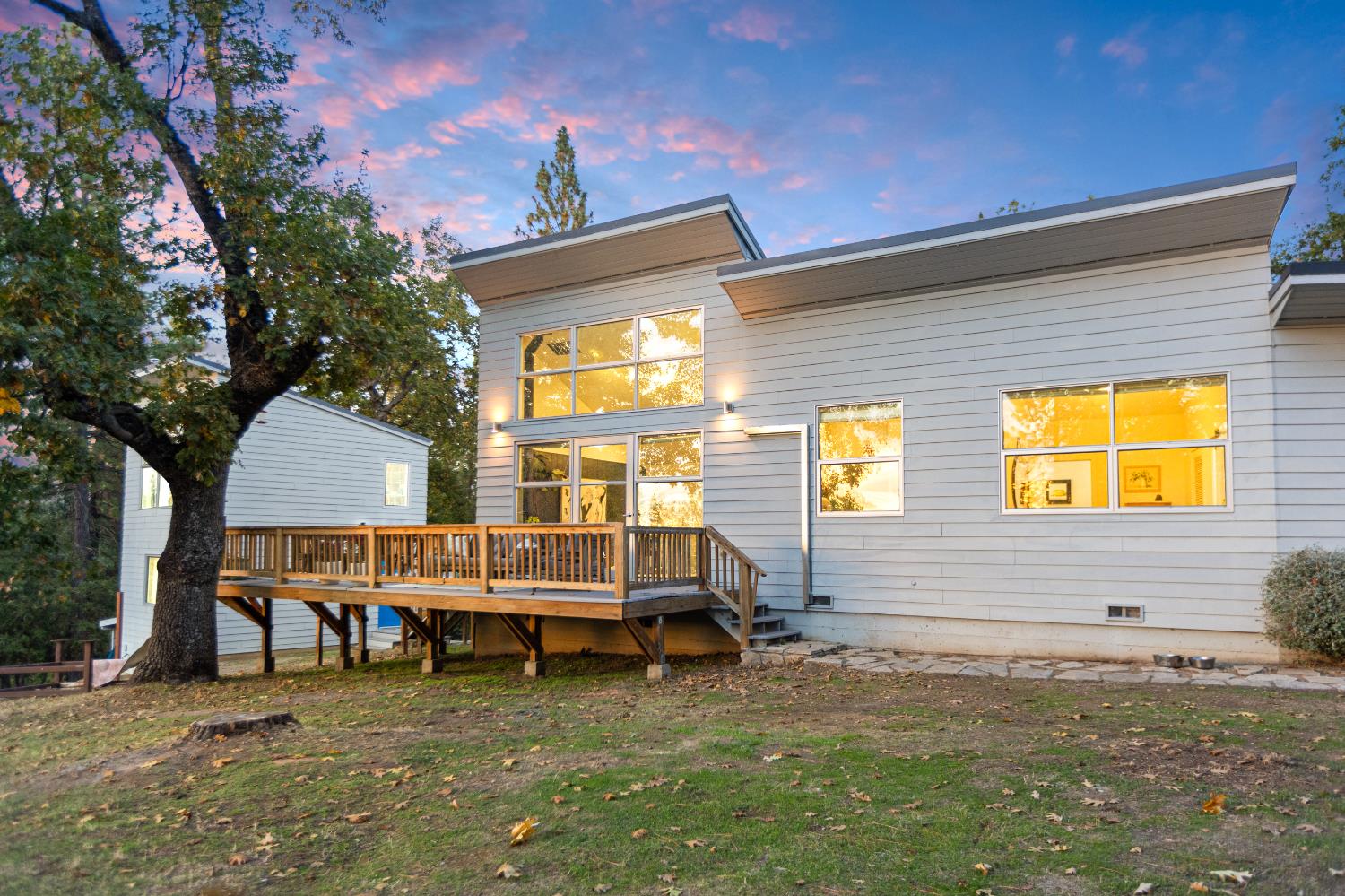 22080 Fiddletown Road Volcano, CA 95689 - Photo 73 of 94 a backyard of a house with barbeque oven table and chairs