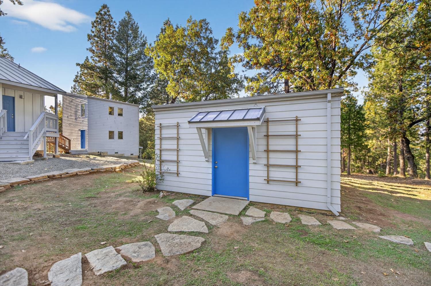 22080 Fiddletown Road Volcano, CA 95689 - Photo 75 of 94 a front view of a house with a yard