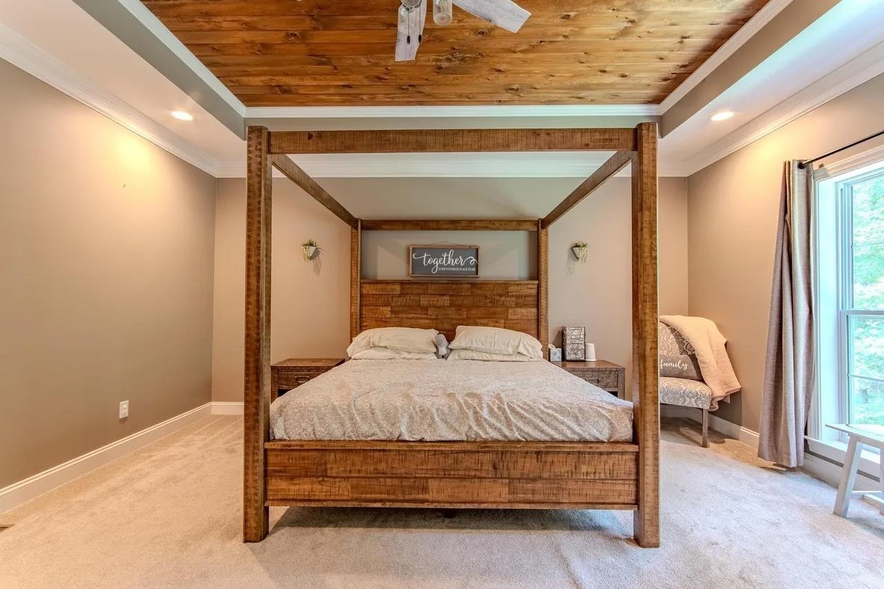 2134 Otis Plunk Road Bethel Springs, TN 38315 - Photo 11 of 35 a bedroom with a bed and a window