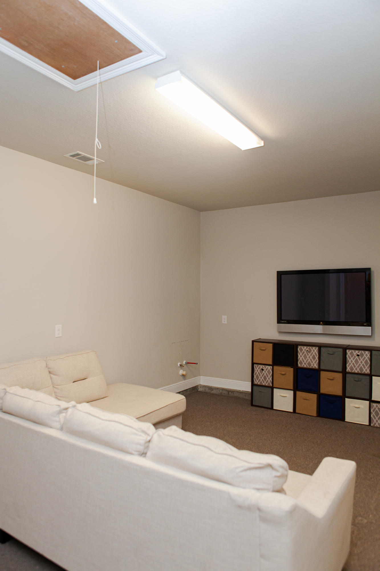 107 Maddox Street Santa Rosa Beach, FL 32459 - Photo 14 of 37 a living room with a furniture and a flat screen tv
