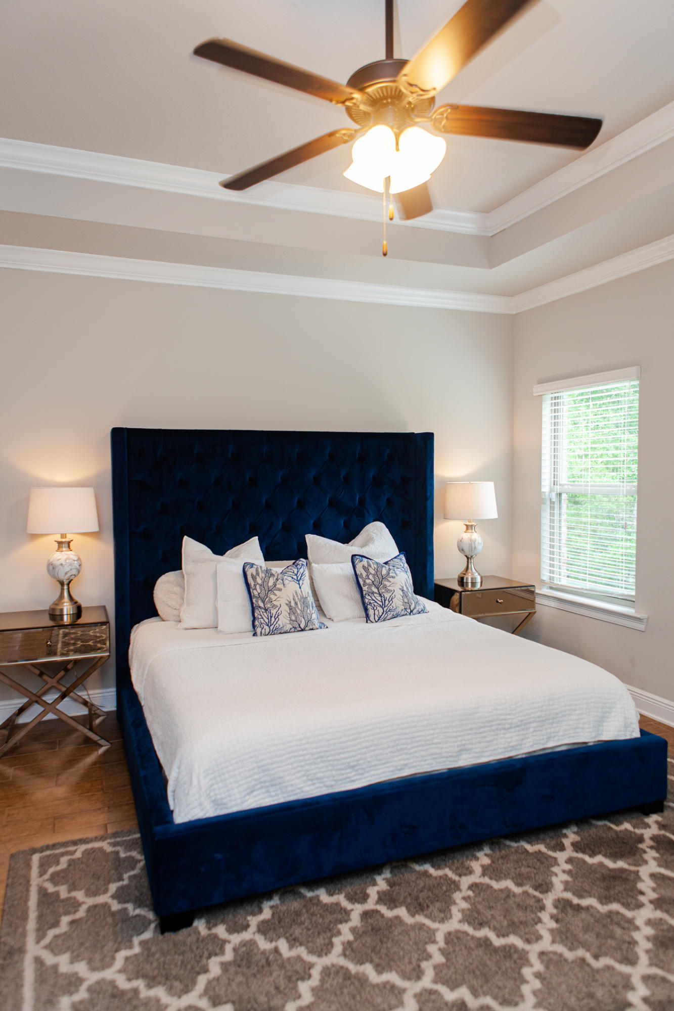 107 Maddox Street Santa Rosa Beach, FL 32459 - Photo 29 of 37 a bedroom with a bed and a ceiling fan