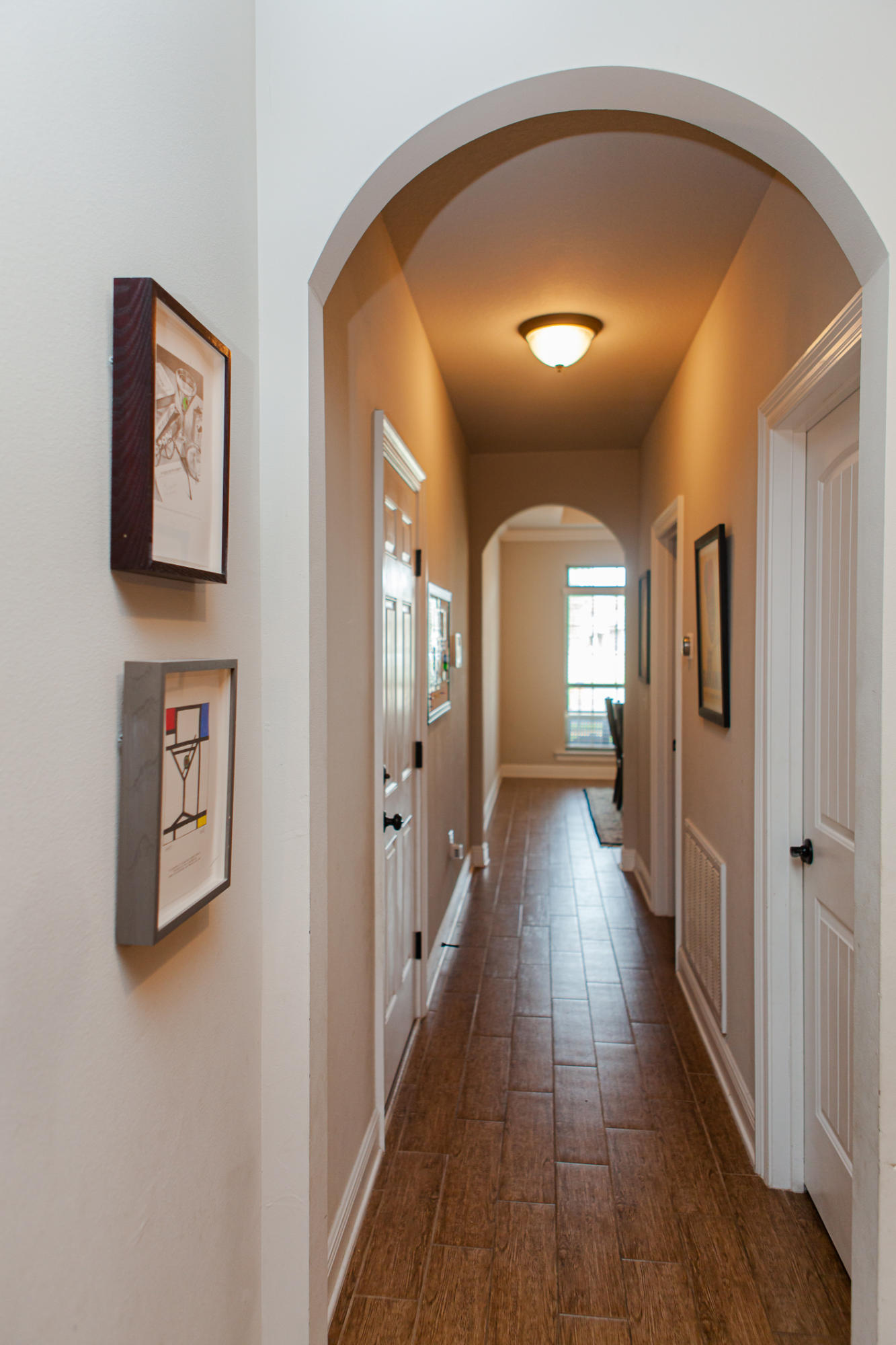 107 Maddox Street Santa Rosa Beach, FL 32459 - Photo 3 of 37 a view of a hallway with wooden floor