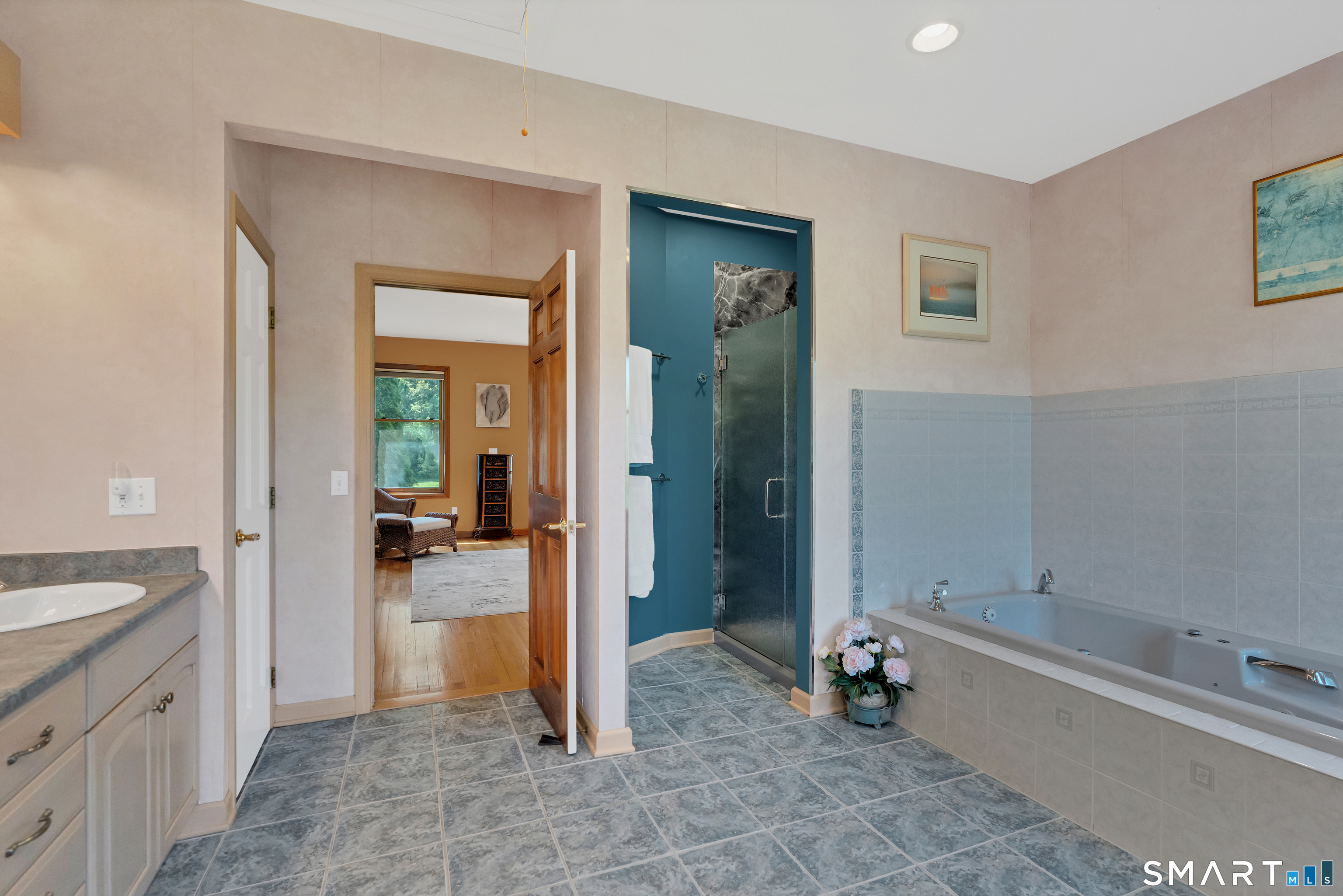194 Quaker Farms Road Oxford, CT 06478 - Photo 22 of 40 a spacious bathroom with a tub sink and mirror