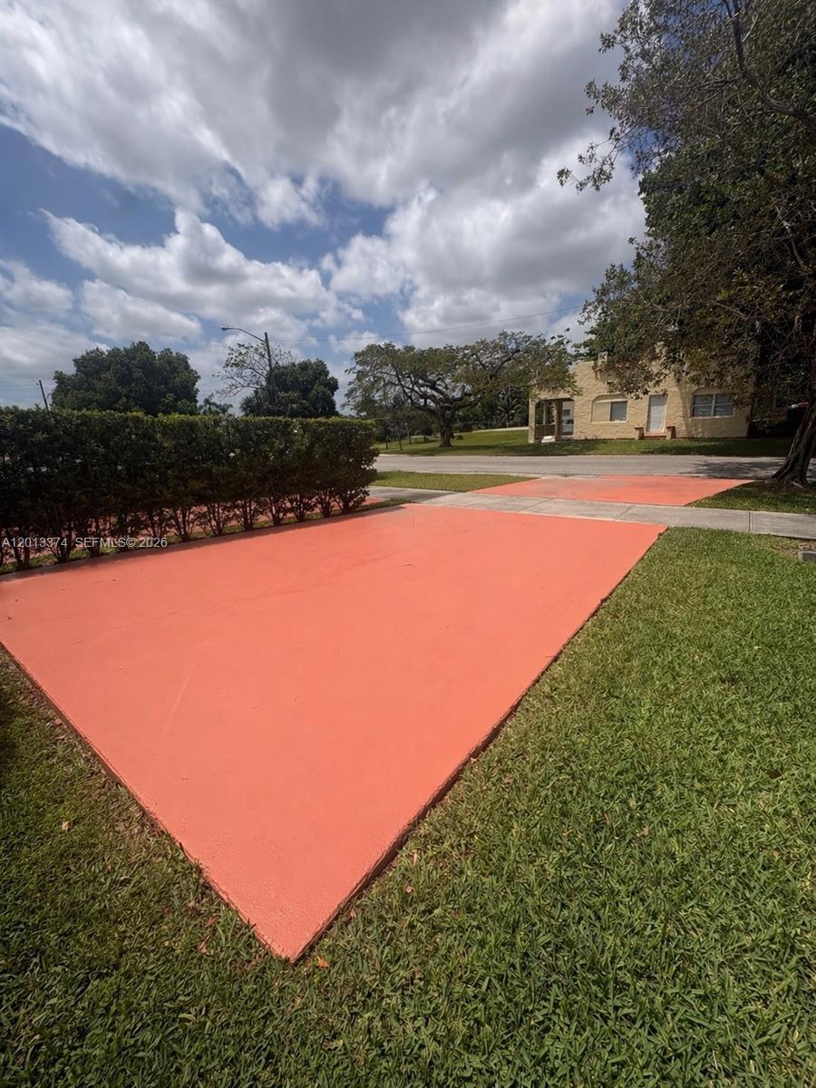993 Northeast 3rd Avenue Homestead, FL 33030 - Photo 2 of 16 a view of a lake with a yard