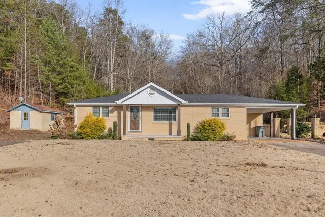 front view of a house with a yard