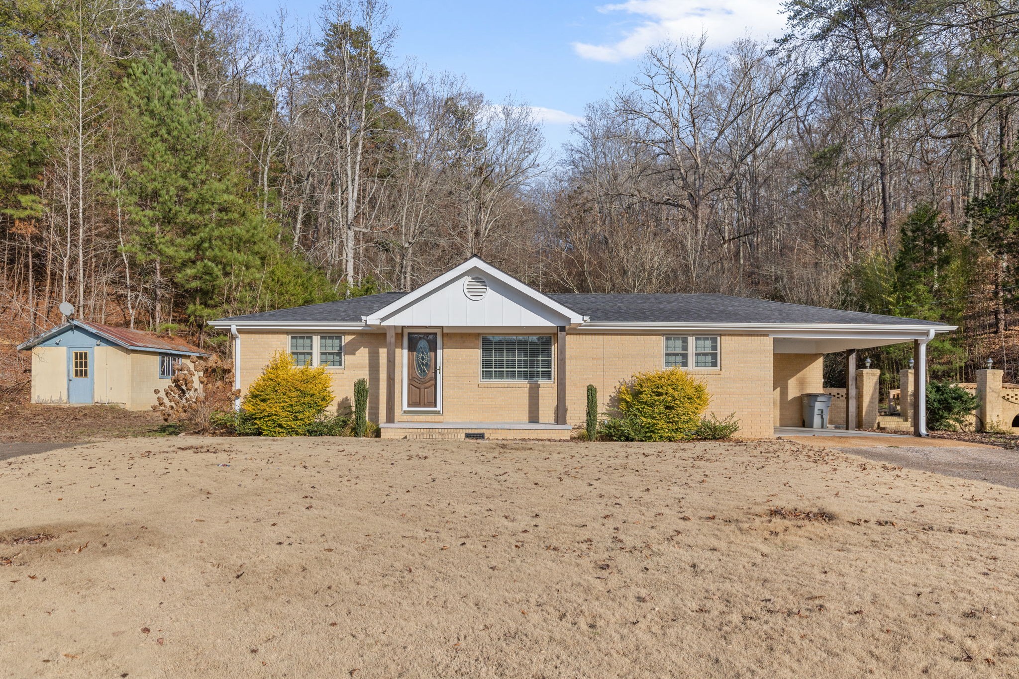 front view of a house with a yard