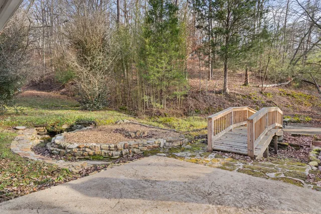 a view of a backyard with wooden floor