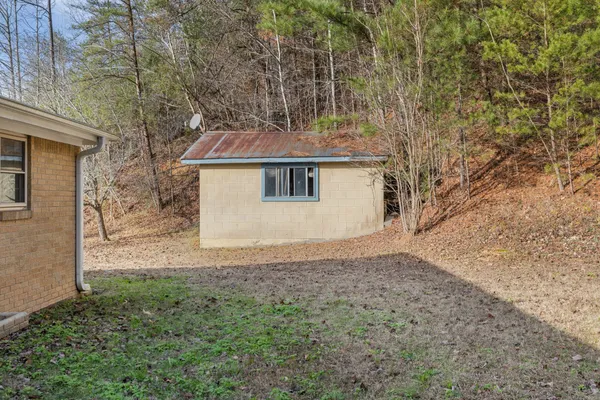 a house with trees in front of it