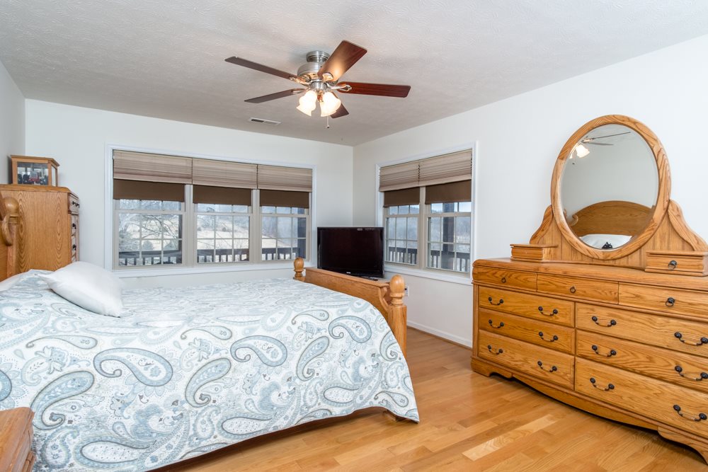194 Hupman Road Churchville, VA 24421 - Photo 14 of 35 a bedroom with a bed and a dresser