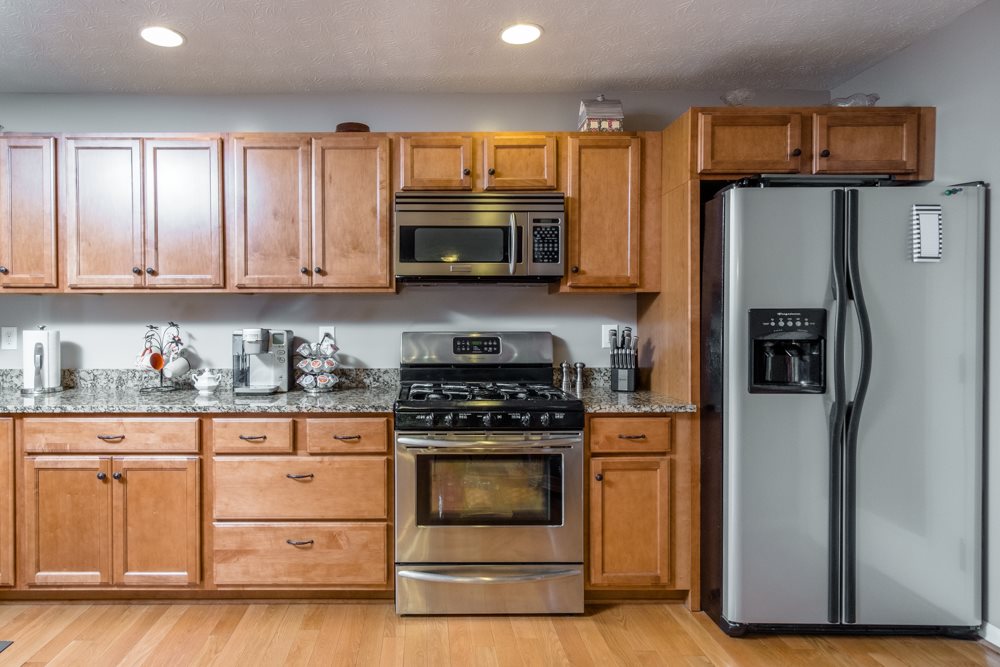 194 Hupman Road Churchville, VA 24421 - Photo 3 of 35 a kitchen with stainless steel appliances granite countertop a stove a refrigerator and a microwave