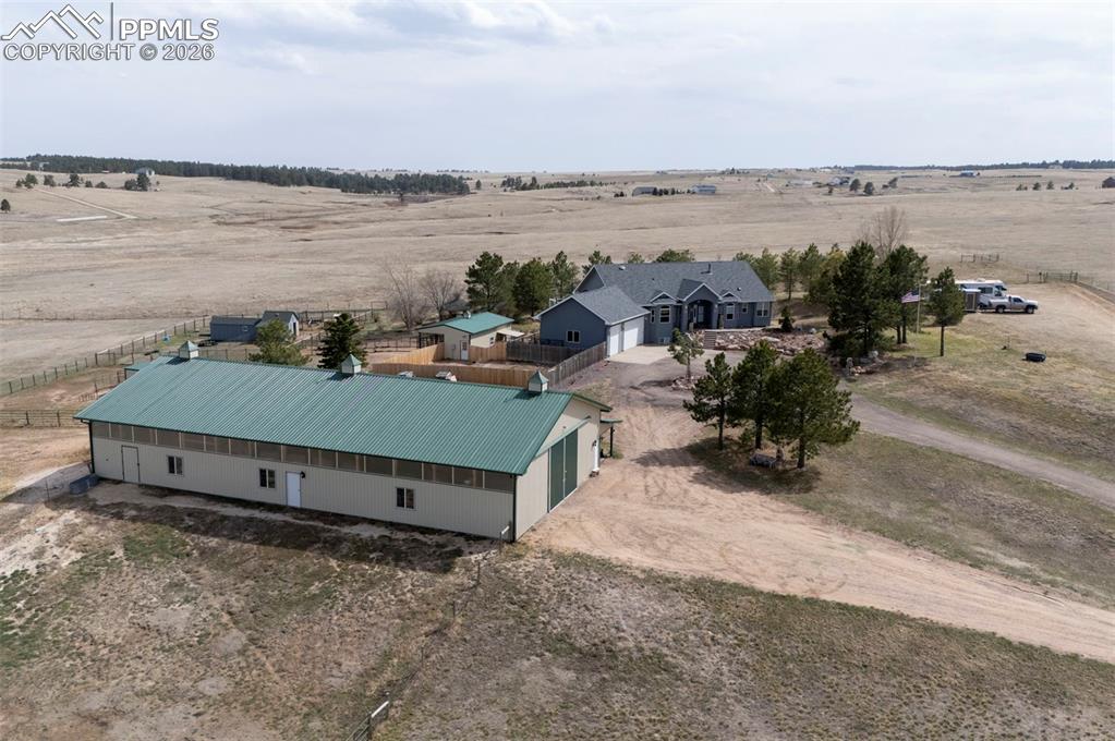 5910 McCart Ranch Circle Elizabeth, CO 80107 - Photo 46 of 50 an aerial view of a house with lake view