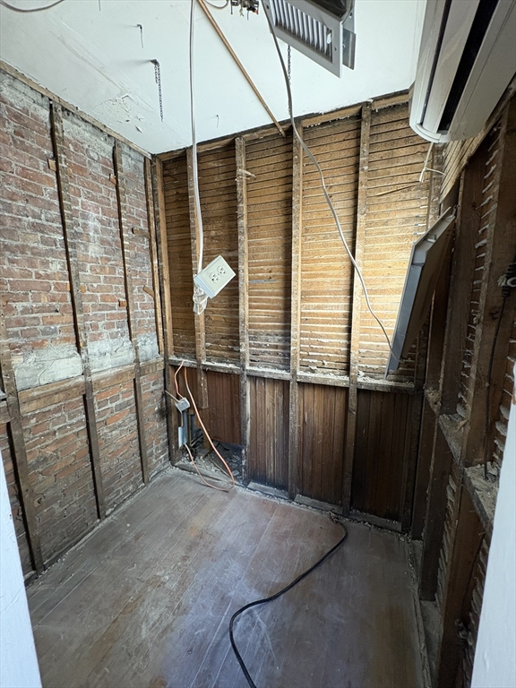 2020 Massachusetts Avenue, Unit 1 Cambridge, MA 02140 - Photo 10 of 11 a view of a room with gym equipment