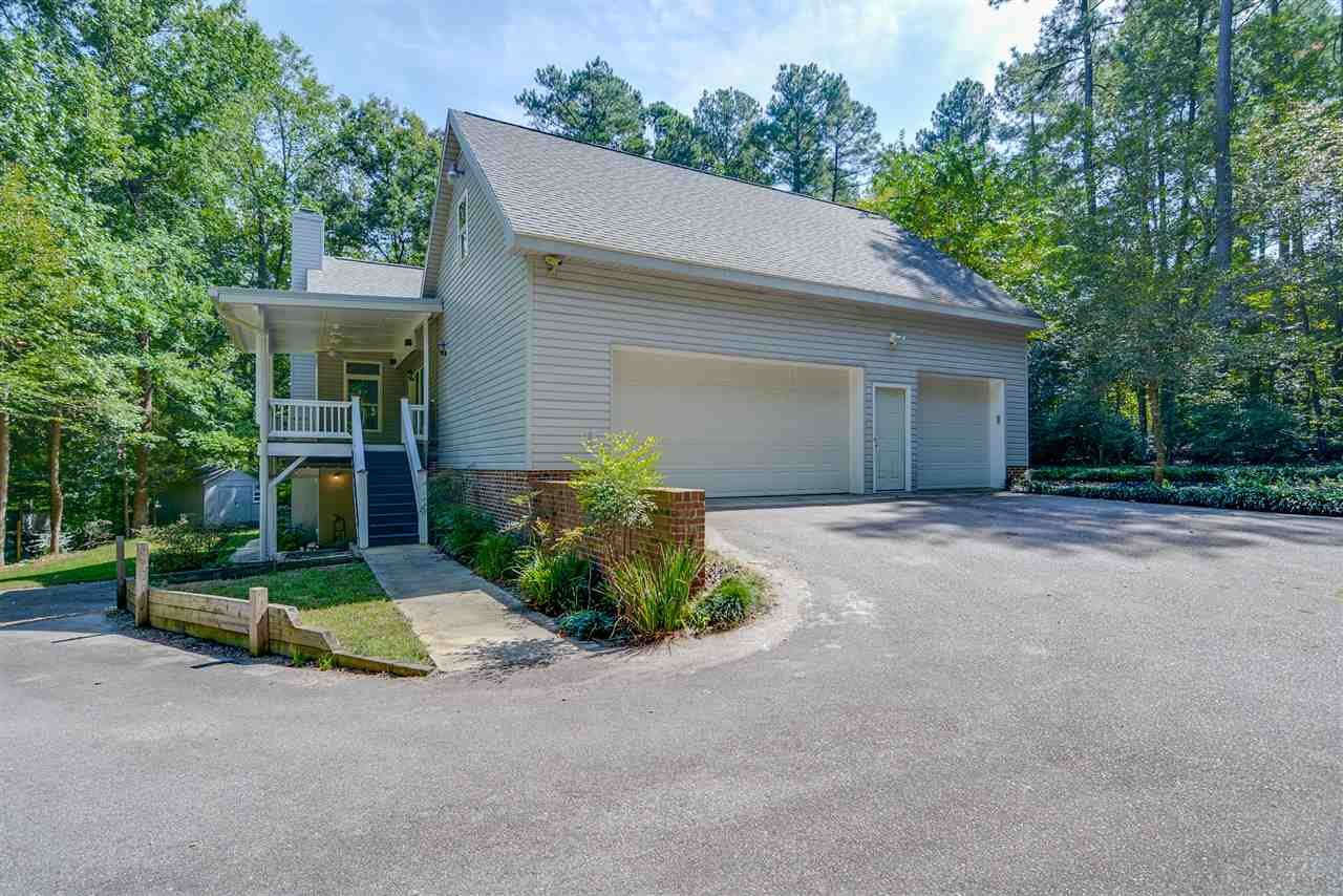 12925 Ghoston Road Wake Forest, NC 27587 - Photo 2 of 24 4 car garage. 3 on main level. 4th on basement level. Perfect for car projects, boat... Garage