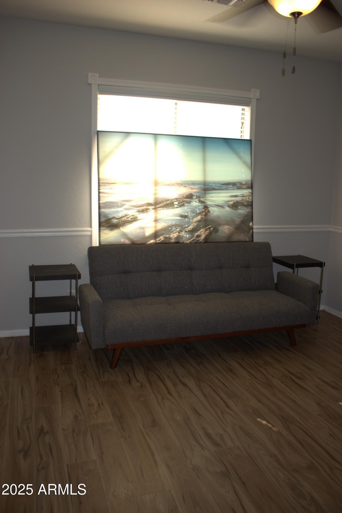 1433 West Longhorn Drive Chandler, AZ 85286 - Photo 20 of 27 a living room with furniture and a large window