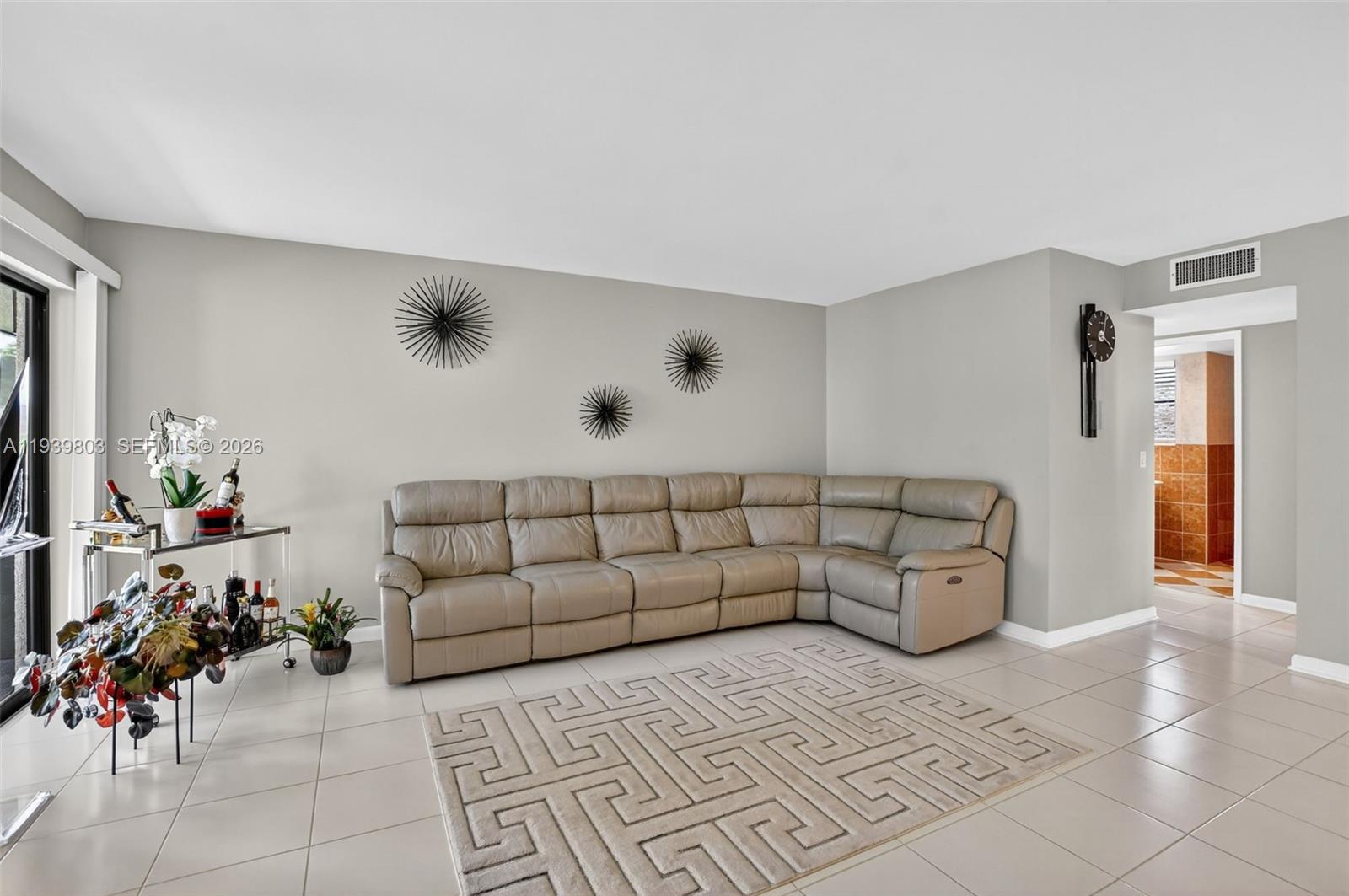 5901 Camino Del Sol, Unit 207 Boca Raton, FL 33433 - Photo 12 of 53 a living room with furniture
