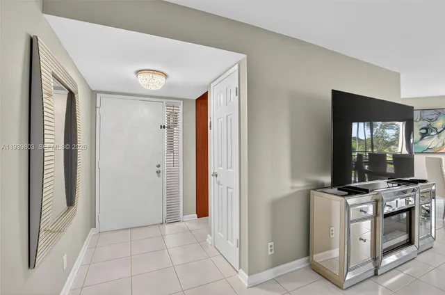 a view of a kitchen with electric appliances