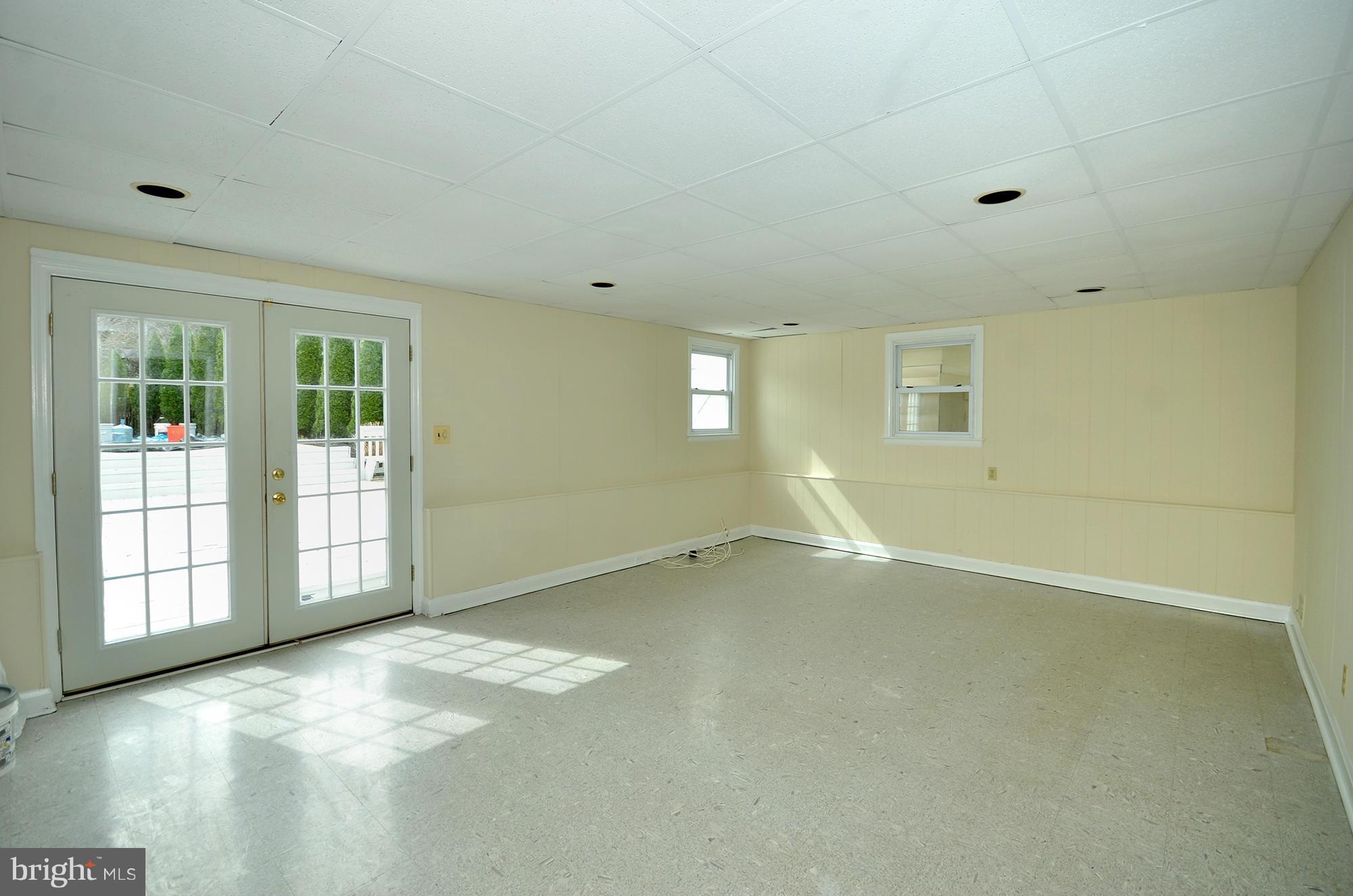 207 Felton Road Lutherville-Timonium, MD 21093 - Photo 13 of 30 Finished Lower Level with walkout to deck