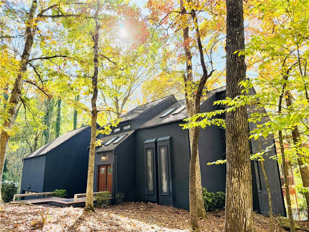 175 River Ct Parkway Atlanta, GA 30328 - Photo 1 of 50 a view of a house with a tree