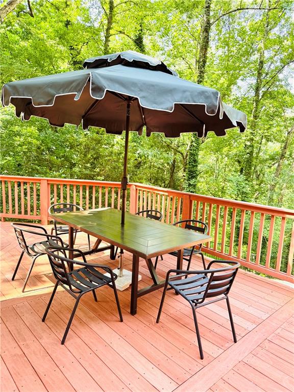 175 River Ct Parkway Atlanta, GA 30328 - Photo 48 of 50 a view of a chairs on wooden deck