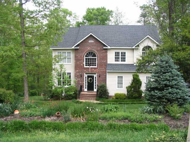 11407 Shell Harbor Chesterfield, VA 23838 - Photo 1 of 10 a view of a house with yard and plants