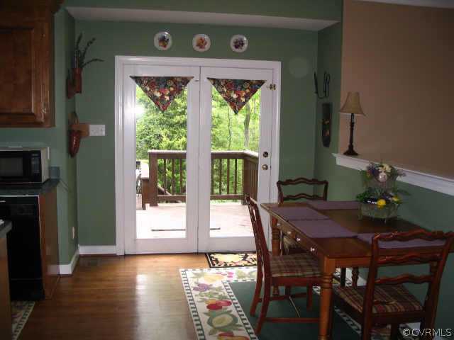 11407 Shell Harbor Chesterfield, VA 23838 - Photo 9 of 10 a view of a dining room with furniture window and outside view