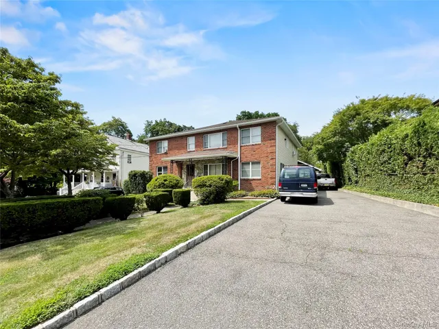 a view of a house with a patio