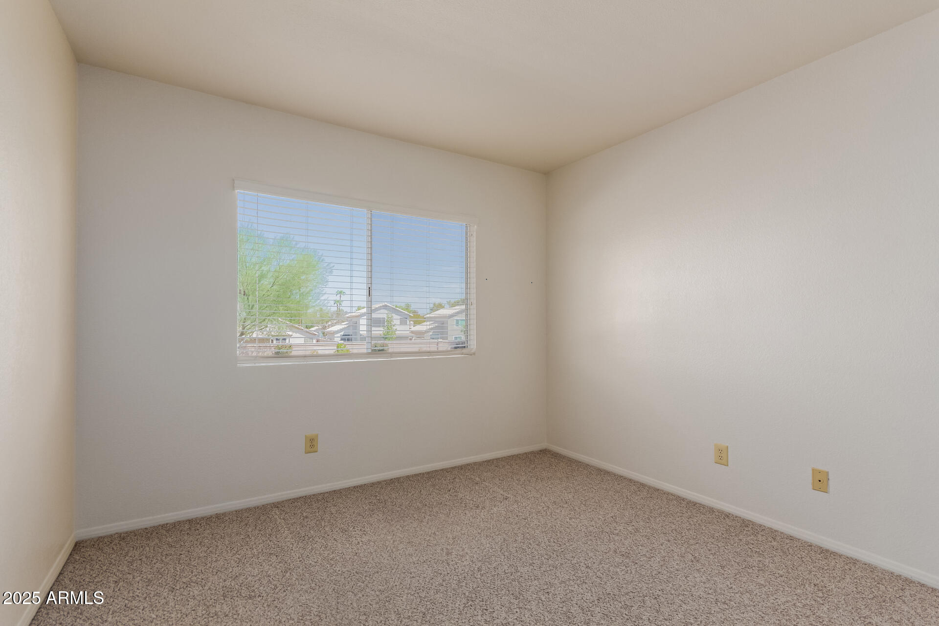 1825 West Ray Road, Unit 2070 Chandler, AZ 85224 - Photo 20 of 51 an empty room with a window