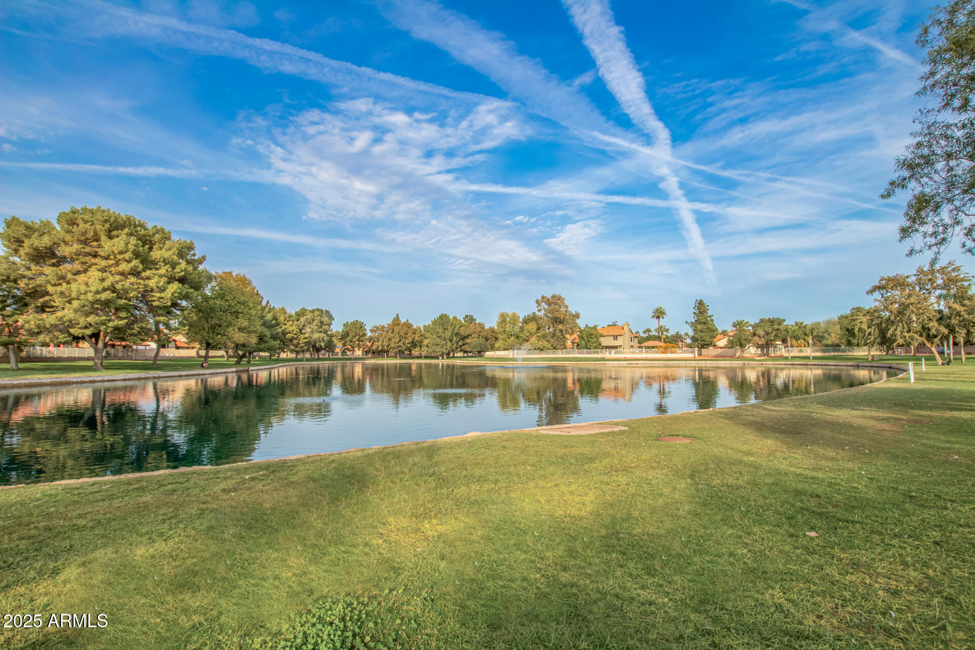 1825 West Ray Road, Unit 2070 Chandler, AZ 85224 - Photo 40 of 51 a view of lake with houses