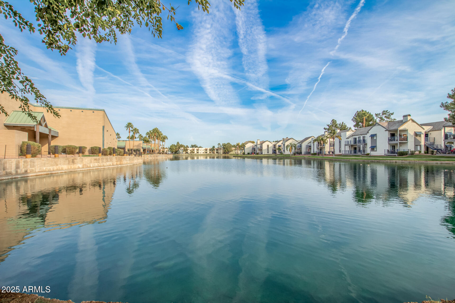 1825 West Ray Road, Unit 2070 Chandler, AZ 85224 - Photo 42 of 51 a view of a lake with houses