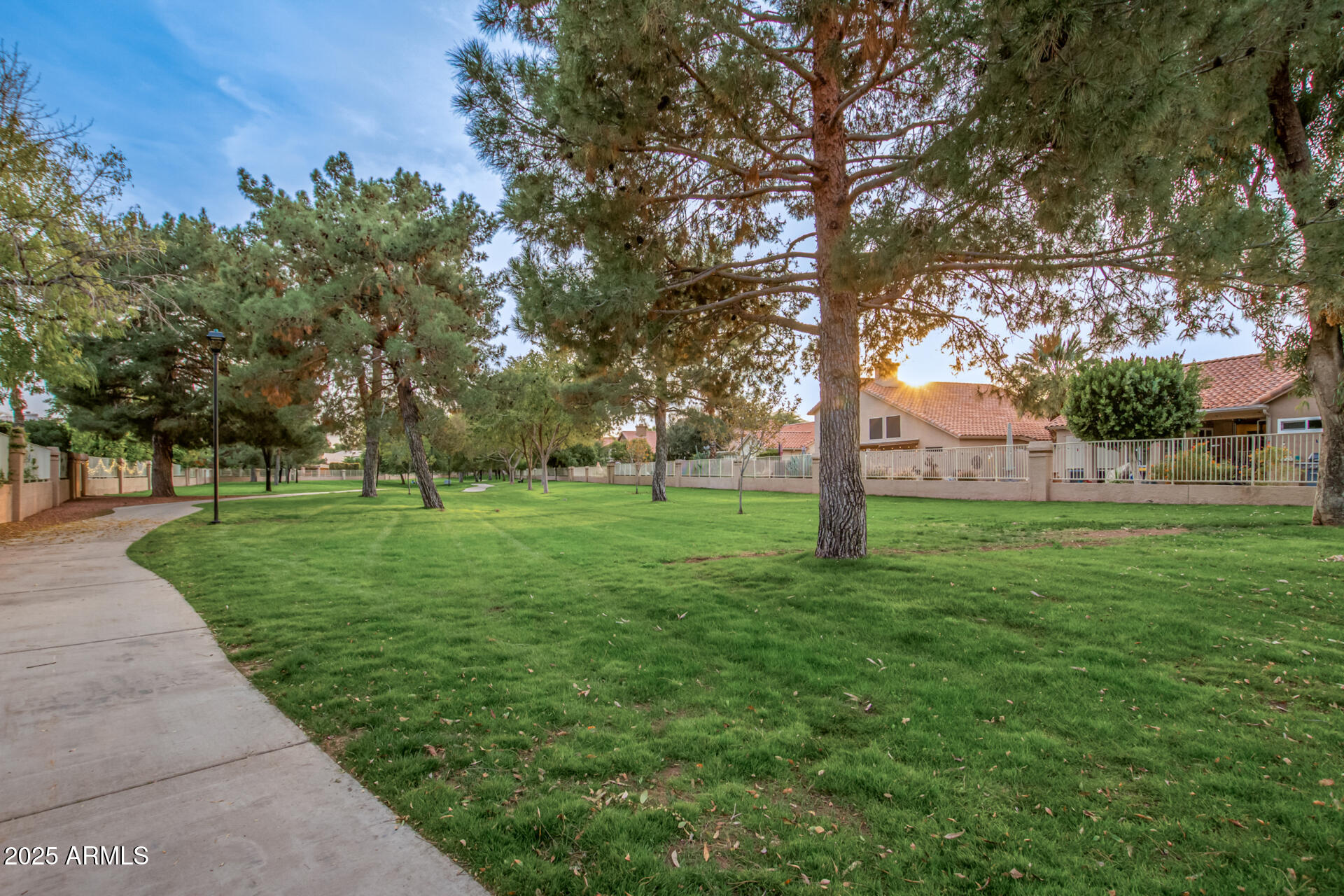 1825 West Ray Road, Unit 2070 Chandler, AZ 85224 - Photo 47 of 51 a huge green field with lots of trees
