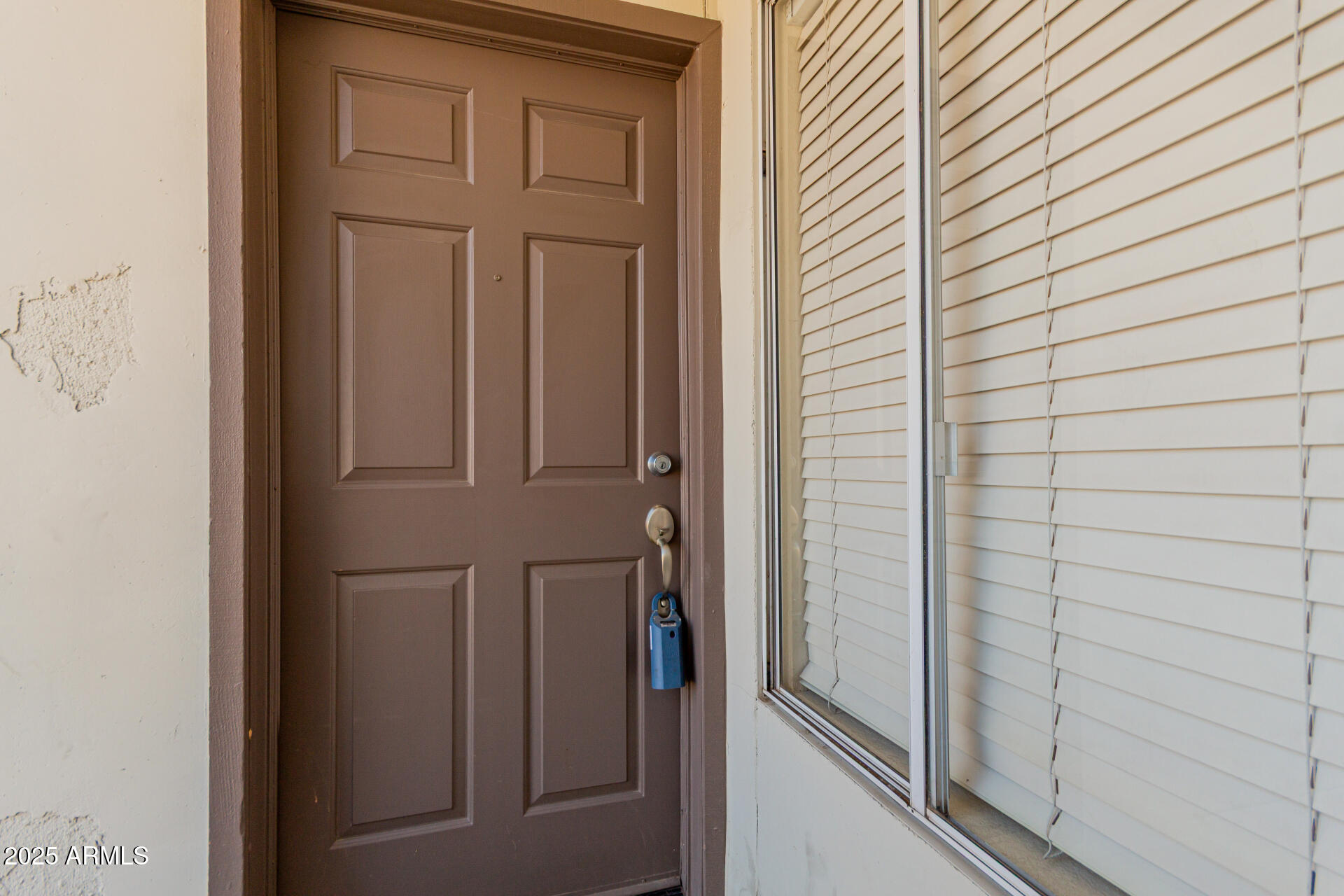 1825 West Ray Road, Unit 2070 Chandler, AZ 85224 - Photo 6 of 51 a view of a wooden door