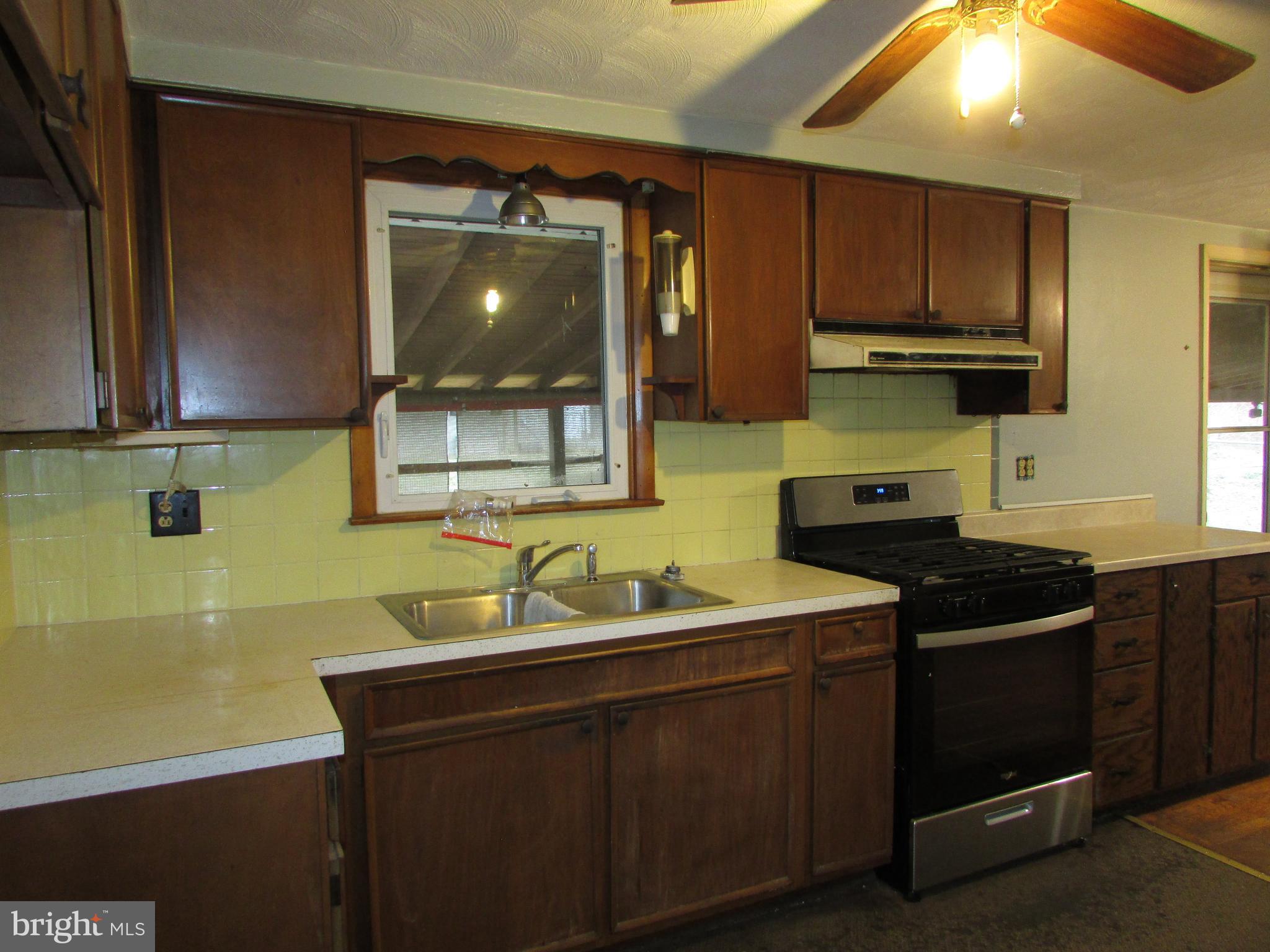 270 Rosedale Drive Manchester, PA 17345 - Photo 7 of 15 a kitchen with a sink and cabinets