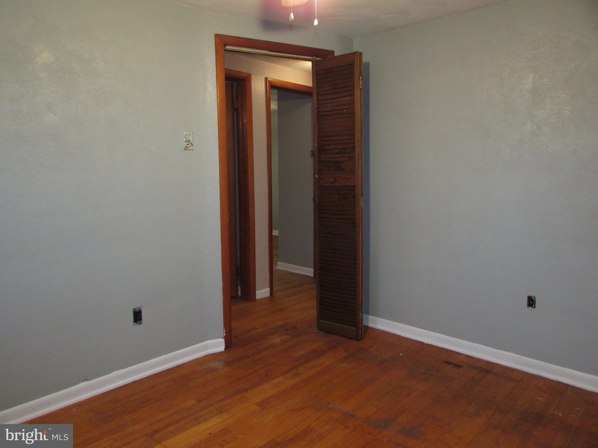 270 Rosedale Drive Manchester, PA 17345 - Photo 9 of 15 a view of an empty room with wooden floor and closet