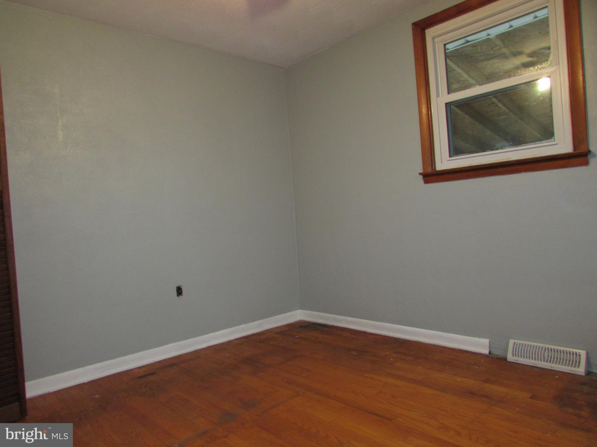 270 Rosedale Drive Manchester, PA 17345 - Photo 10 of 15 a view of an empty room with wooden floor and closet