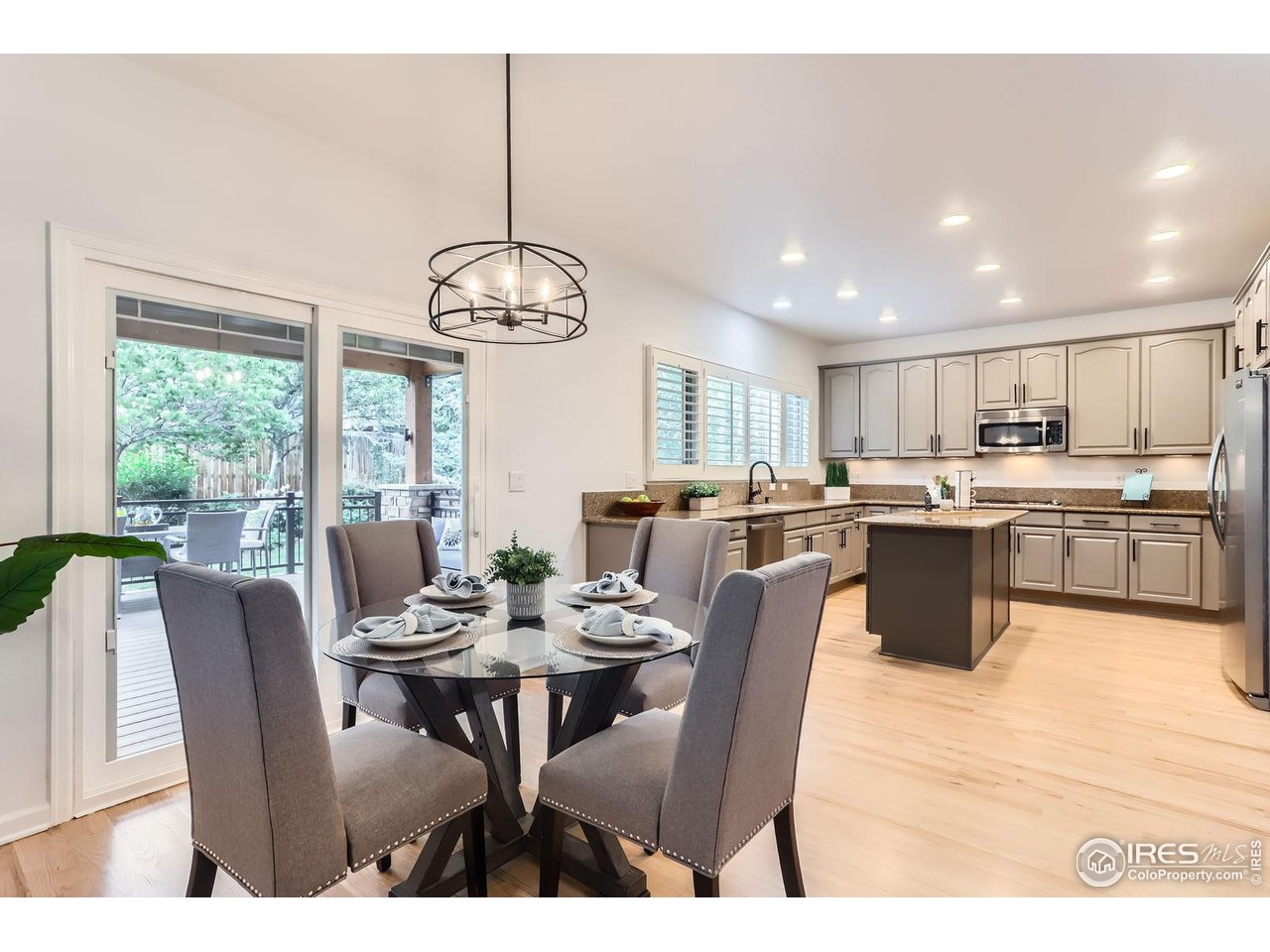 1069 Monarch Way Superior, CO 80027 - Photo 11 of 40 a view of a dining room with furniture window and outside view