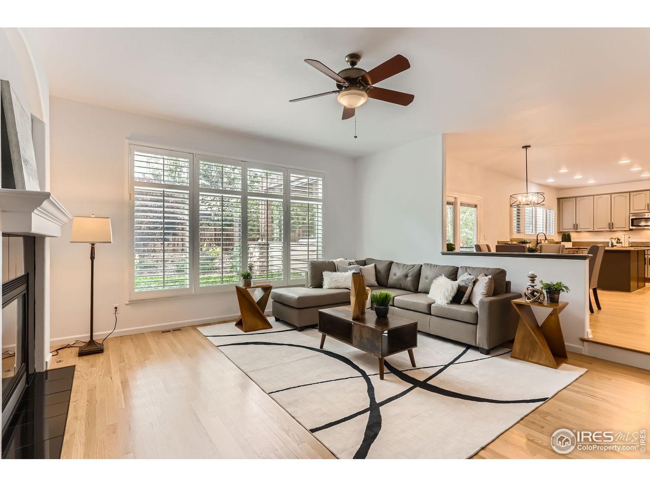 1069 Monarch Way Superior, CO 80027 - Photo 13 of 40 a living room with furniture and a large window