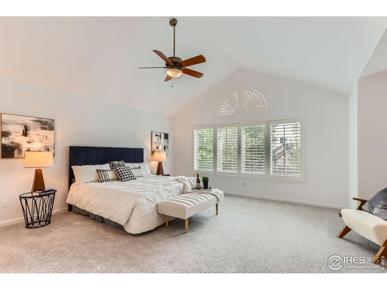 1069 Monarch Way Superior, CO 80027 - Photo 16 of 40 a bedroom with a bed furniture and a window
