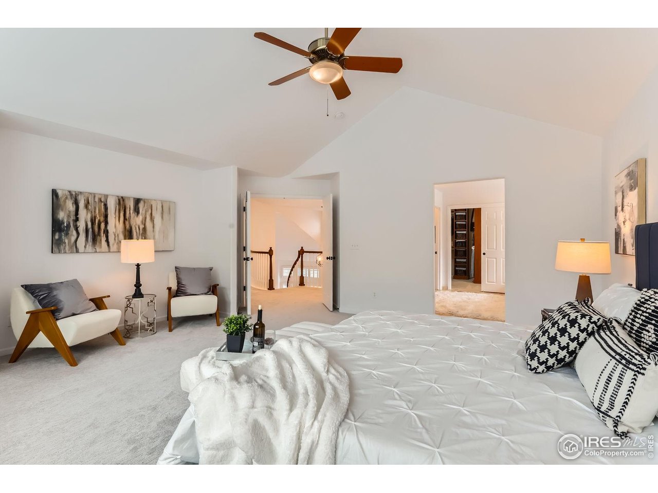 1069 Monarch Way Superior, CO 80027 - Photo 17 of 40 a bedroom with a bed couch and window