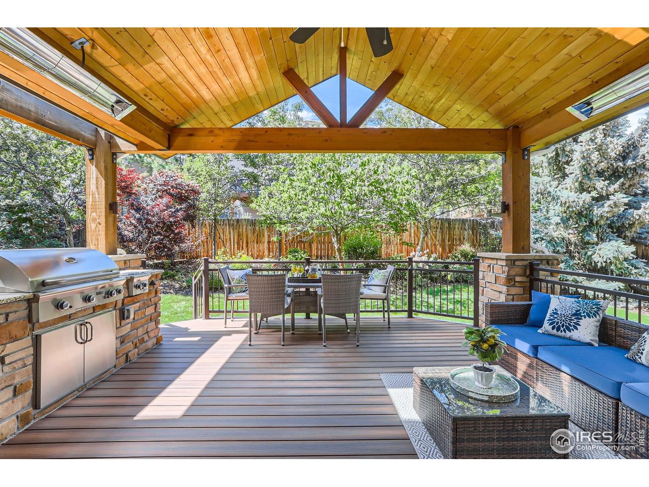 1069 Monarch Way Superior, CO 80027 - Photo 2 of 40 a dining room with furniture and wooden floor