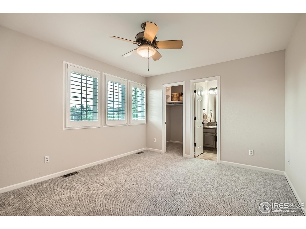 1069 Monarch Way Superior, CO 80027 - Photo 22 of 40 a view of an empty room with a window